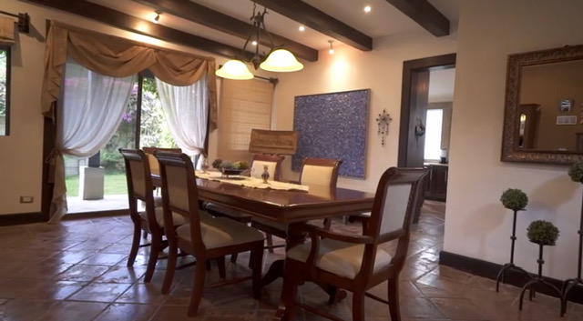 Formal dining room with wood beam ceiling